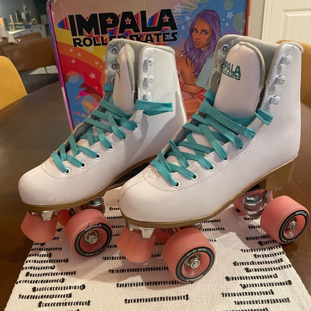 Impala White Roller Skates with Teal Laces